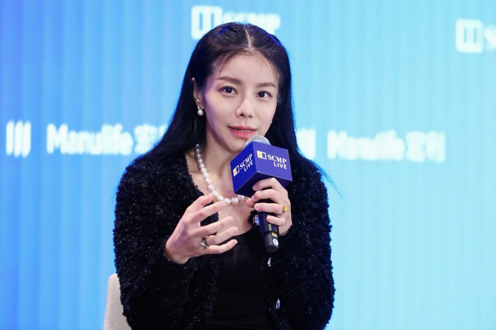 Esther Wong speaking on stage at the SCMP Live panel on Hong Kong's digital economy